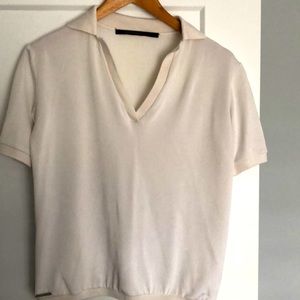 Cream coloured Valentino jeans top.